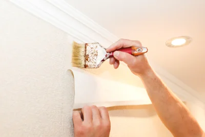 Pose de papier peint à Orain — revêtements muraux et toiles de verre